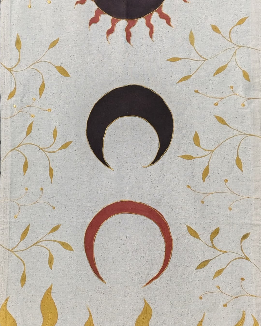 Decorative book cover with celestial symbols and leaf patterns, sun and moon with leaves around. hand painted luxury good for gifting