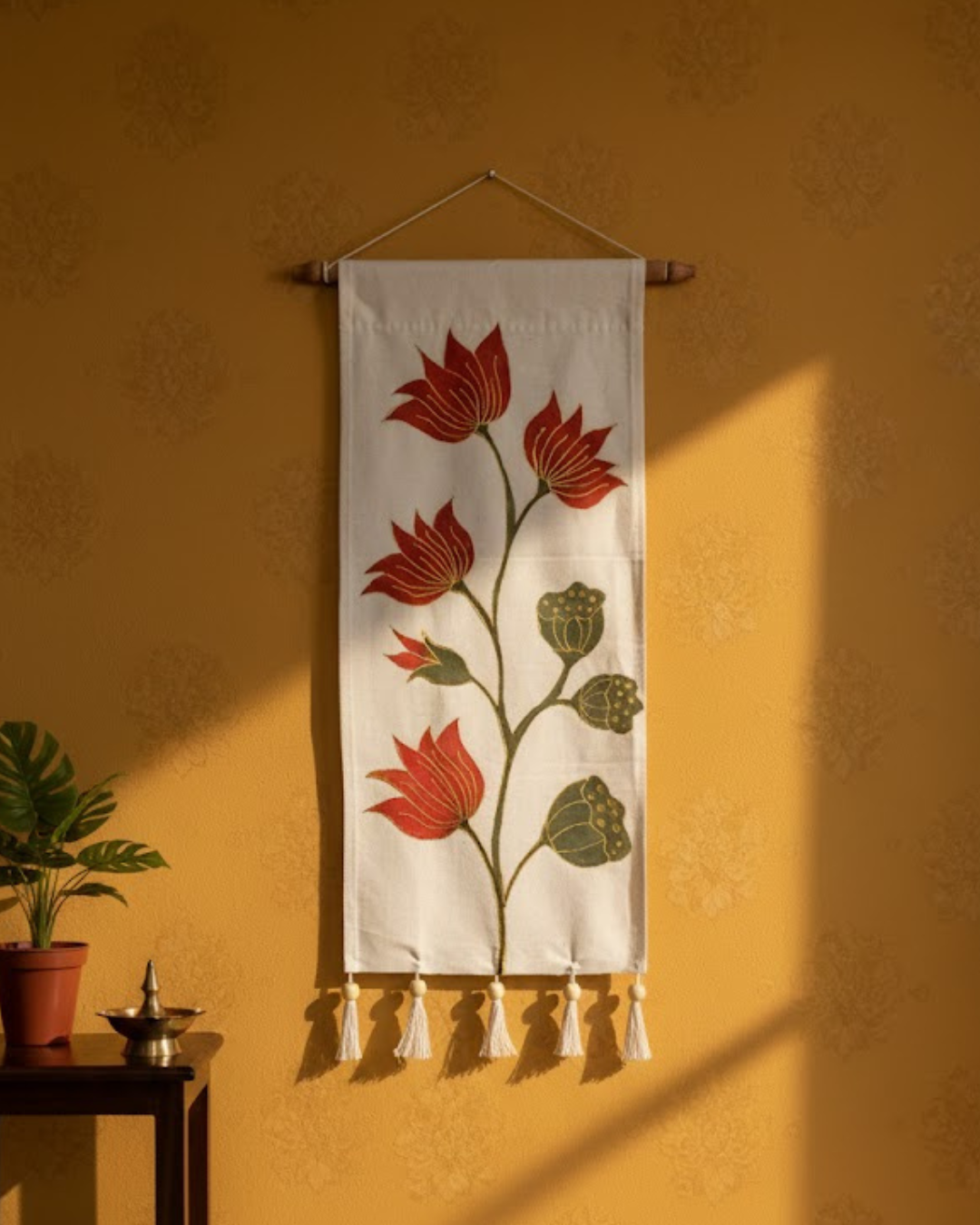 Decorative wall hanging with floral design on a yellow wall. aesthetic tapestry, hand painted, luxury decor