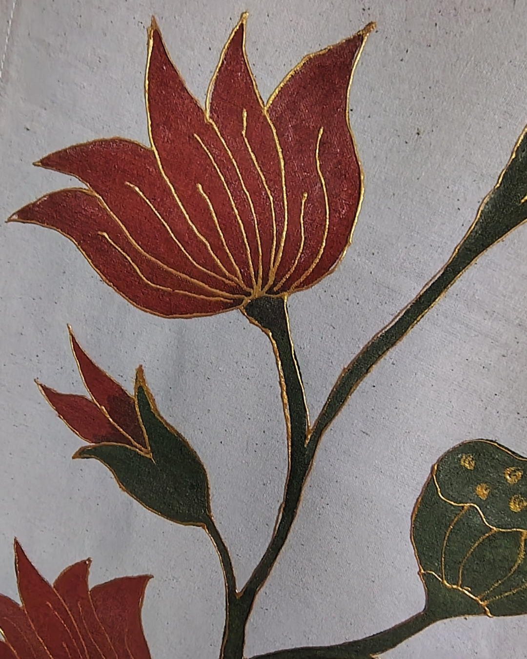 Decorative floral design with red flowers and green leaves on a textured beige background