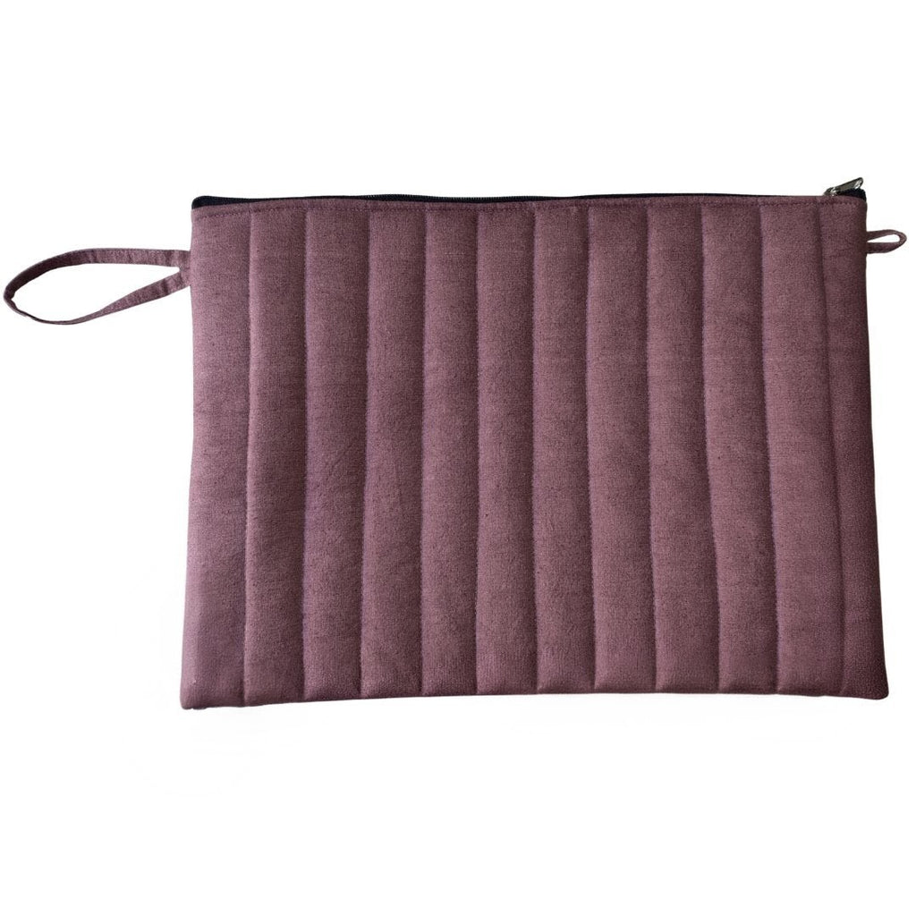 Purple clutch bag with a strap on a white background